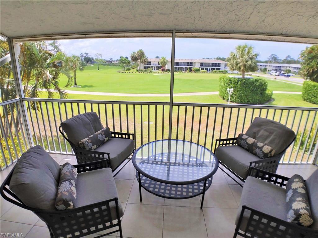 108 Penny Lane, Unit 4 Naples, FL 34112 - Photo 22 of 33 a view of balcony with furniture
