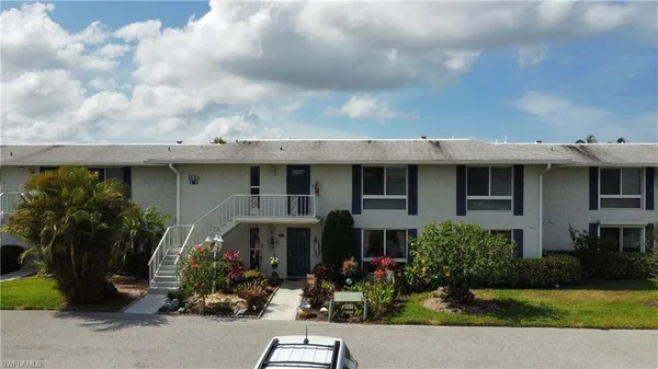 a view of house with an outdoor space