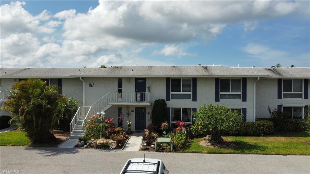 108 Penny Lane, Unit 4 Naples, FL 34112 - Photo 3 of 33 a view of house with an outdoor space