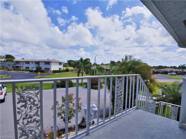 a view of a balcony with city view