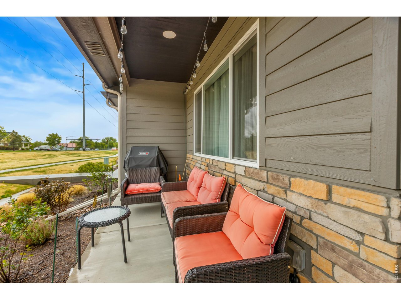 6609 4th St Road, Unit 4 Greeley, CO 80634 - Photo 37 of 41 a backyard of a house with outdoor seating