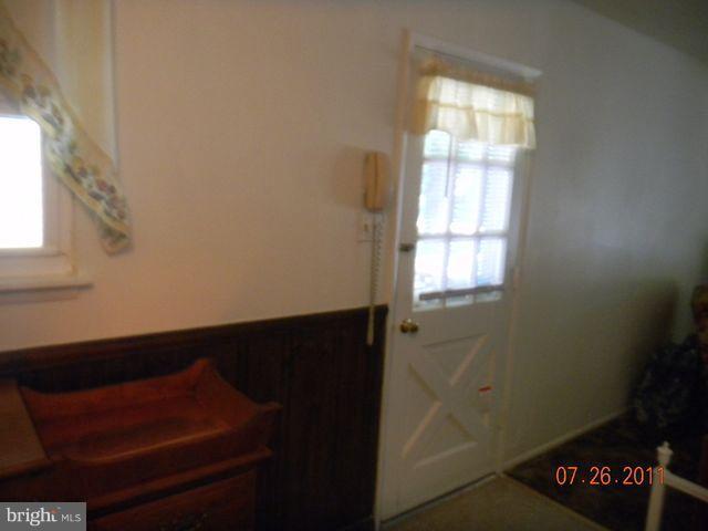 204 Highfalcon Road Reisterstown, MD 21136 - Photo 14 of 17 Side door to Kitchen/Dining Room