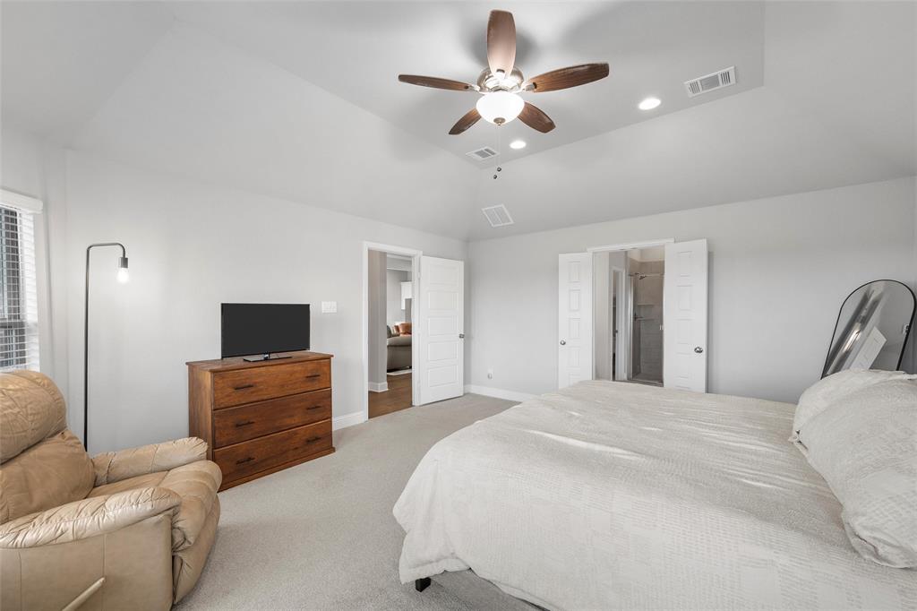 1904 Angelus Street Waco, TX 76712 - Photo 13 of 24 Carpeted bedroom featuring lofted ceiling, recessed lighting, and a ceiling fan