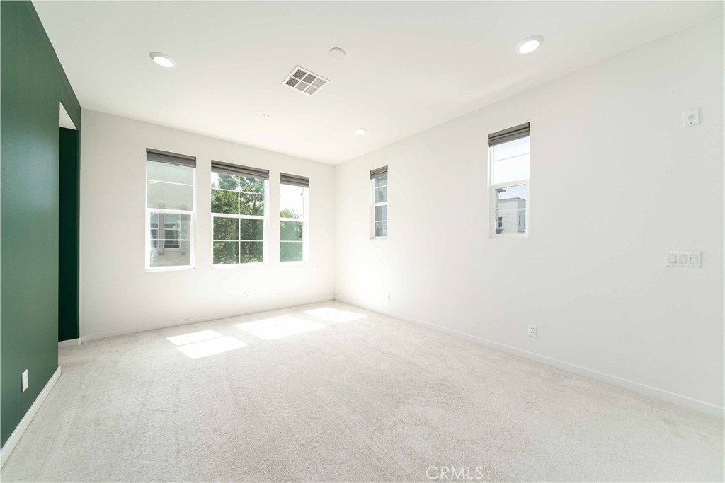 134 Acamar Irvine, CA 92618 - Photo 13 of 56 an empty room with windows