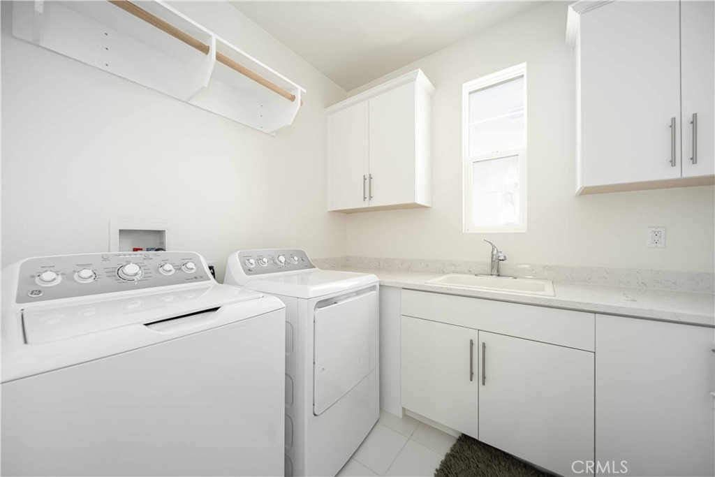 134 Acamar Irvine, CA 92618 - Photo 29 of 56 a utility room with dryer and washer
