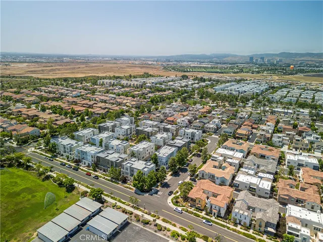 an aerial view of residential building and street