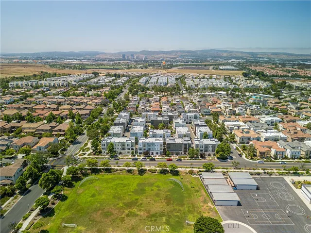 an aerial view of a city with lots of residential buildings