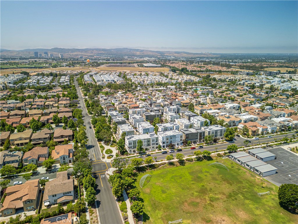 134 Acamar Irvine, CA 92618 - Photo 50 of 56 an aerial view of residential building and lake