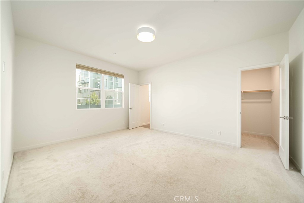 134 Acamar Irvine, CA 92618 - Photo 5 of 56 an empty room with windows and closet