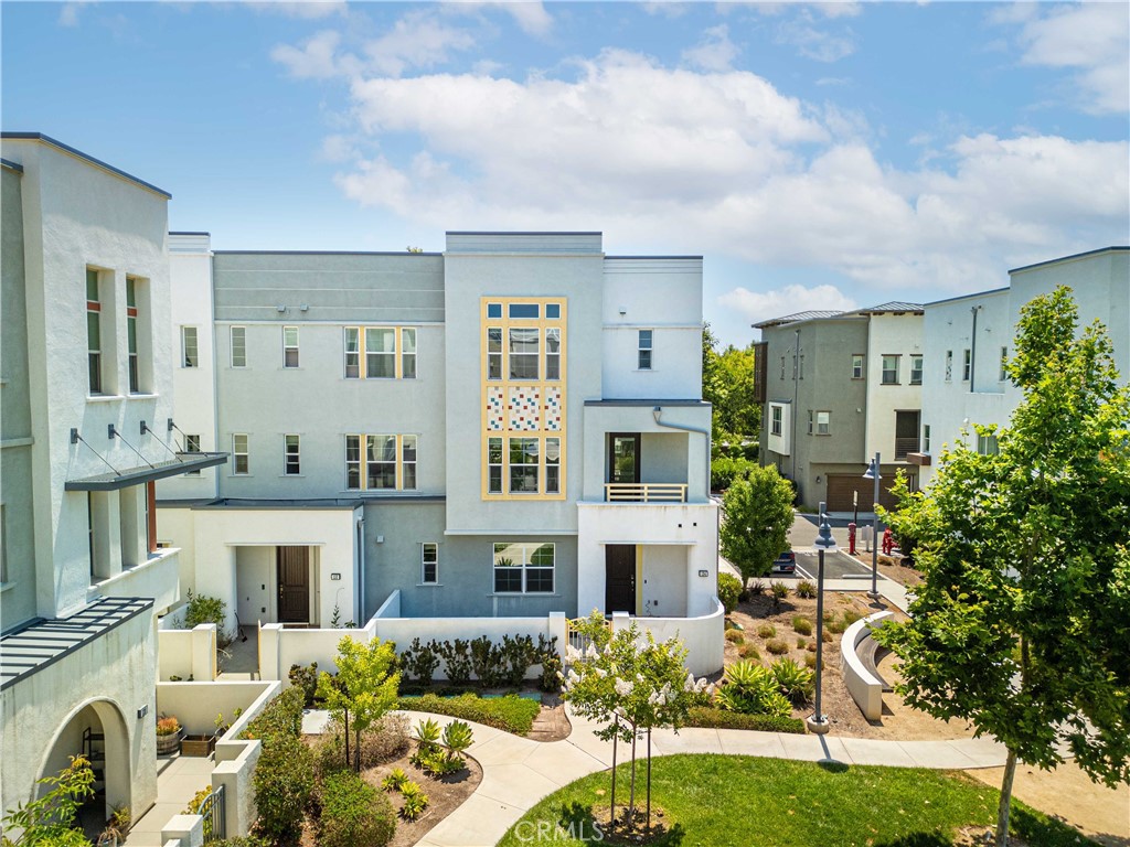 134 Acamar Irvine, CA 92618 - Photo 56 of 56 a front view of a house with a yard