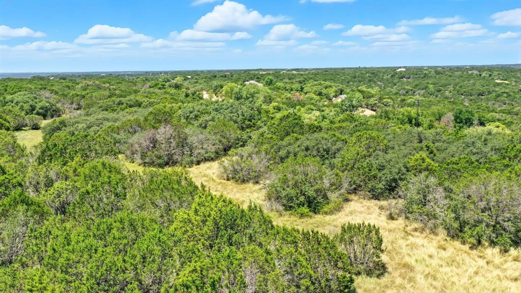 Tbd Ridge Way Drive Bluff Dale, TX 76433 - Photo 7 of 15 a view of a field with an outdoor space
