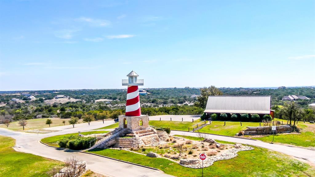 Tbd Ridge Way Drive Bluff Dale, TX 76433 - Photo 8 of 15 a view of swimming pool with a garden and outdoor seating
