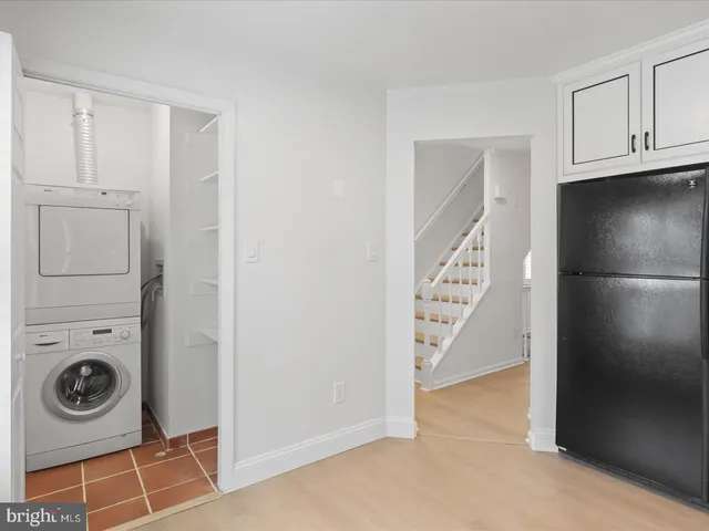 a view of a storage & utility room with washer and dryer