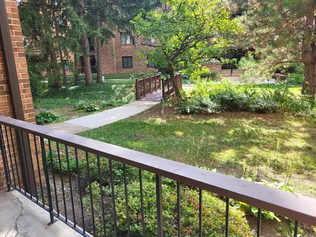 an empty room with wooden floor