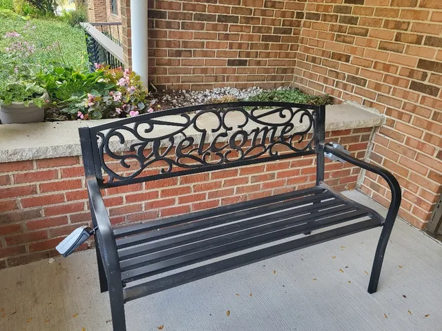 a view of a hallway with seating area