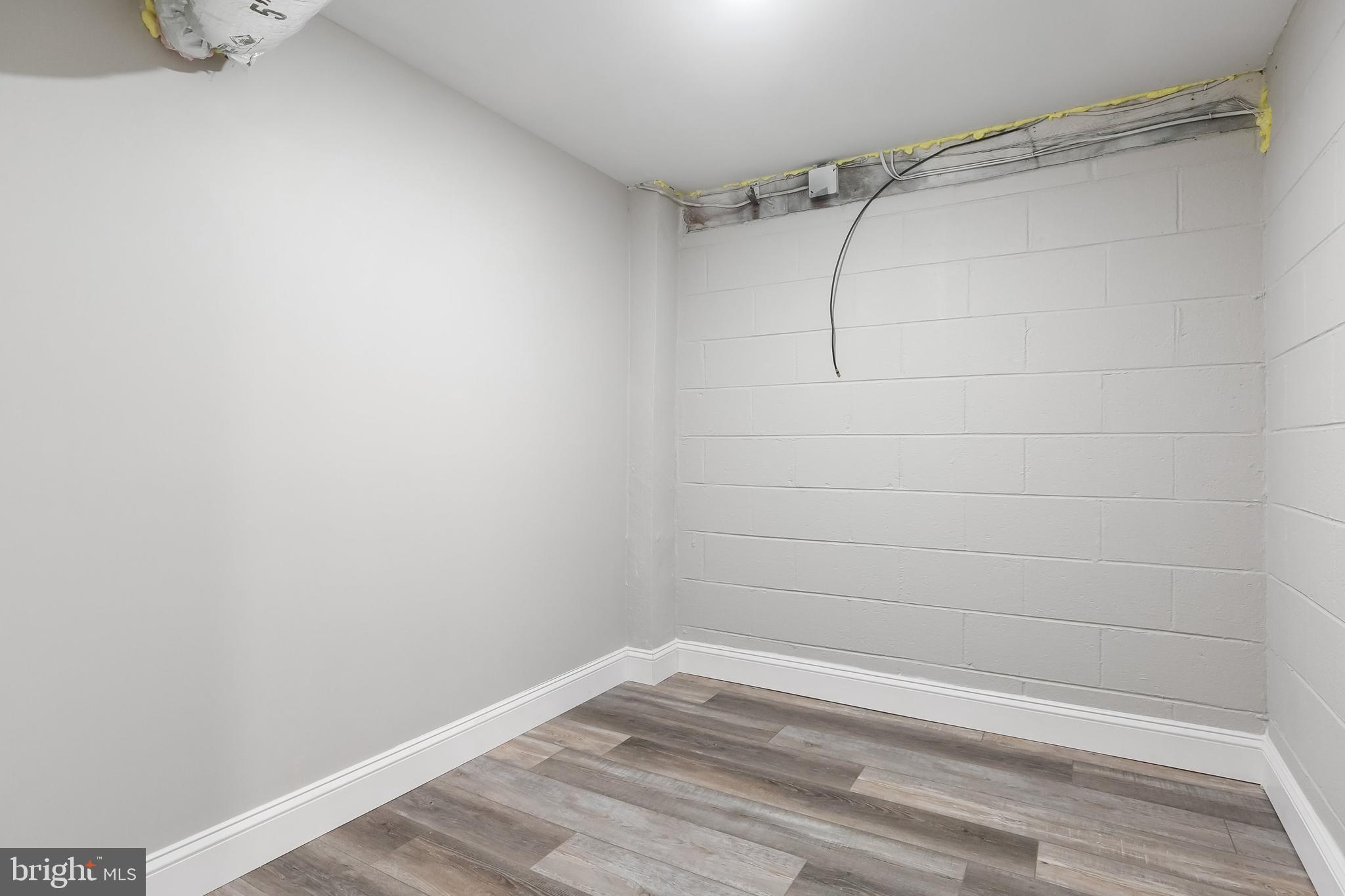 405 Hamilton Road Glassboro, NJ 08028 - Photo 24 of 28 a view of a room with racks on the wall
