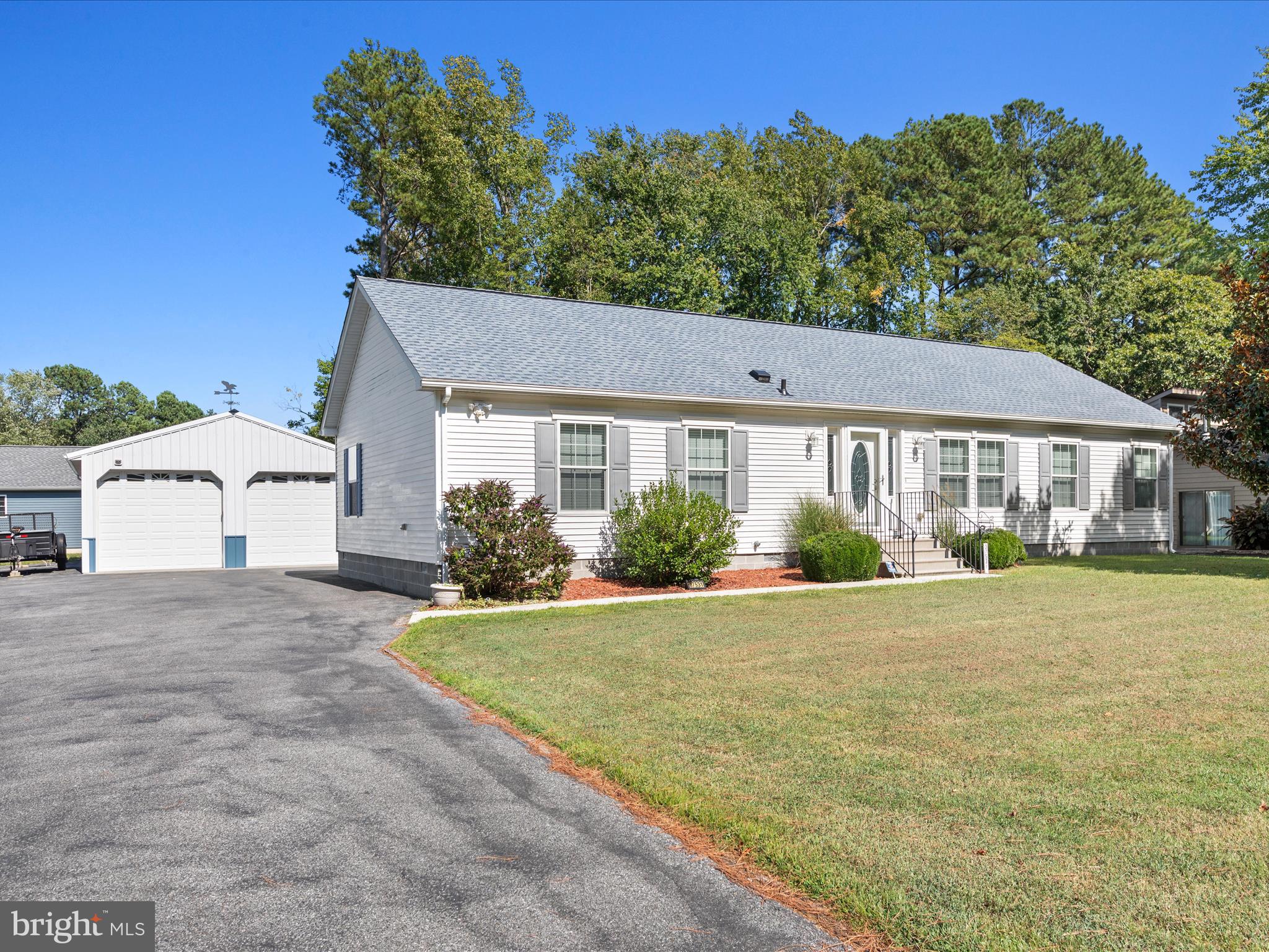 37531 Bonnie Street Ocean View, DE 19970 - Photo 1 of 62 front view of a house with a yard