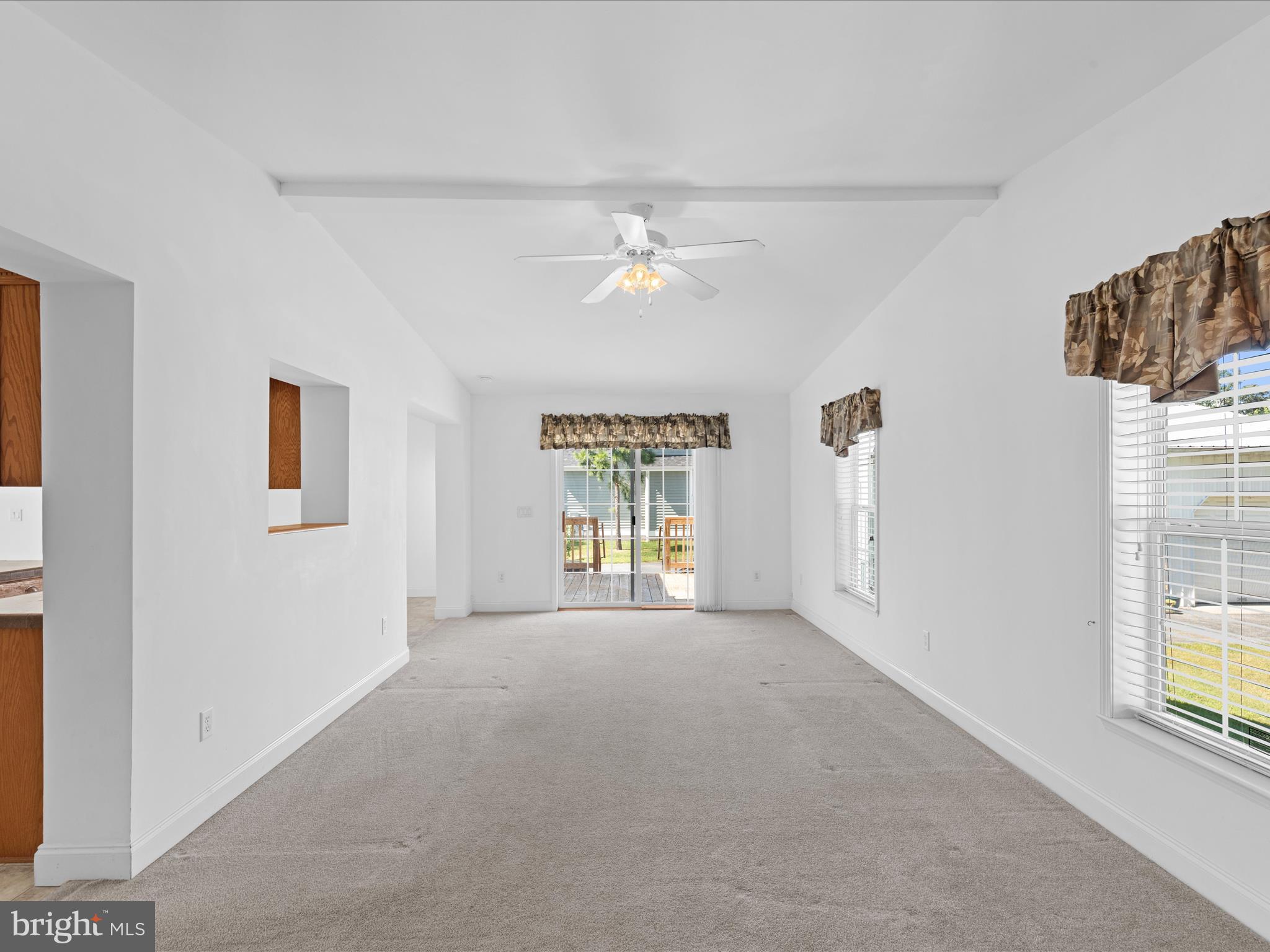 37531 Bonnie Street Ocean View, DE 19970 - Photo 32 of 62 wooden floor in an empty room with a window