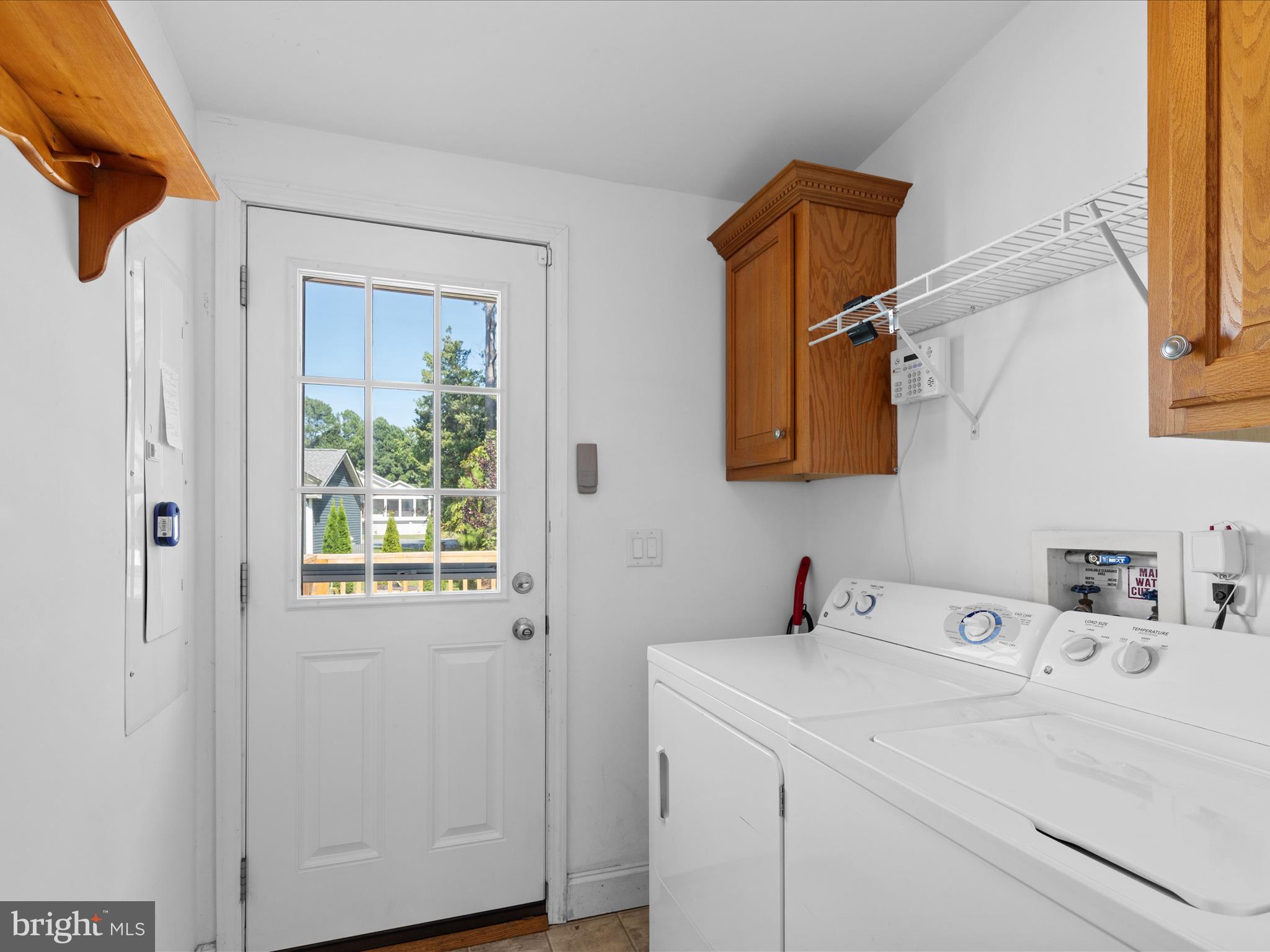 37531 Bonnie Street Ocean View, DE 19970 - Photo 34 of 62 a bathroom with a sink and a mirror