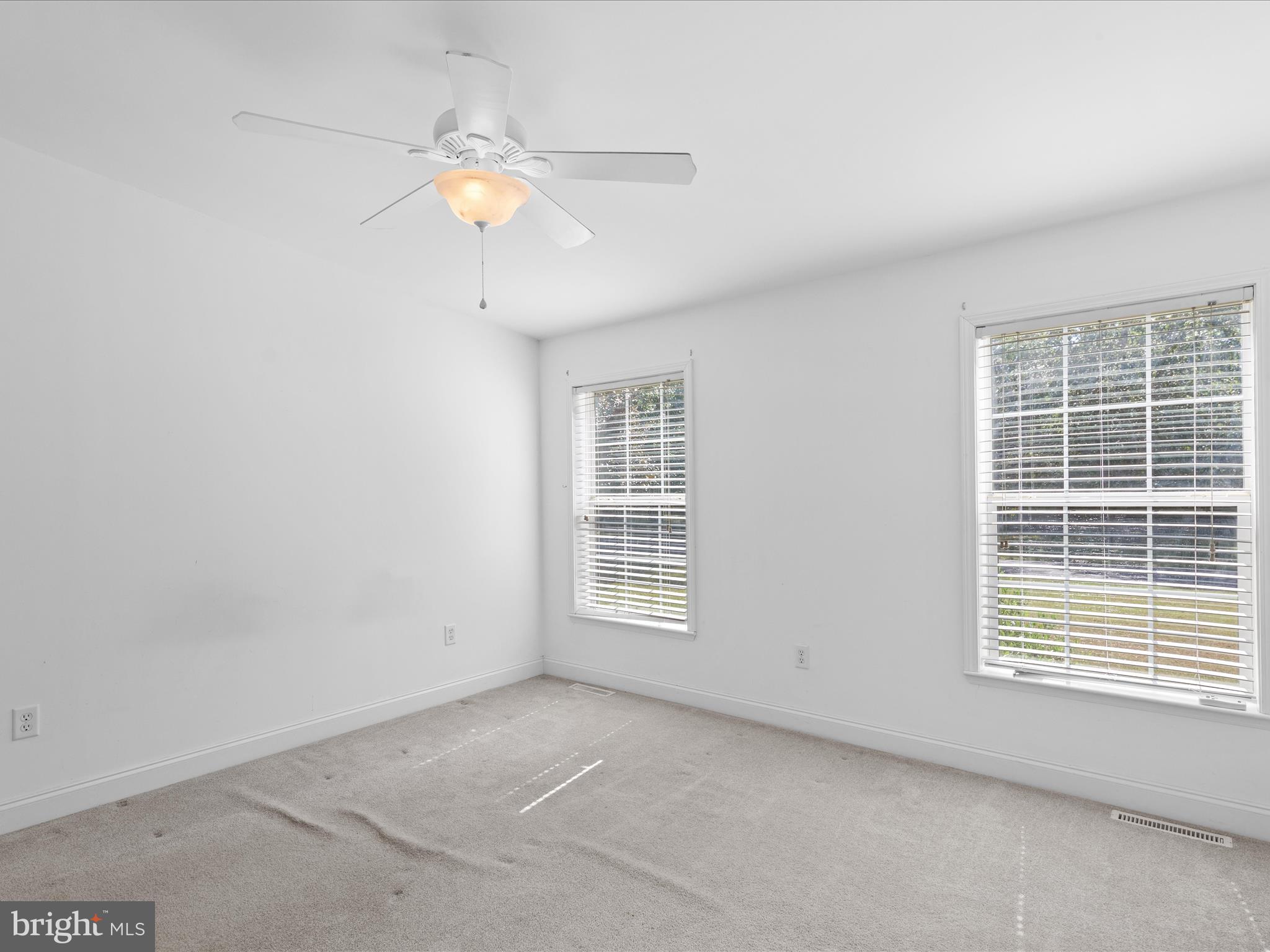 37531 Bonnie Street Ocean View, DE 19970 - Photo 35 of 62 a view of an empty room with a window