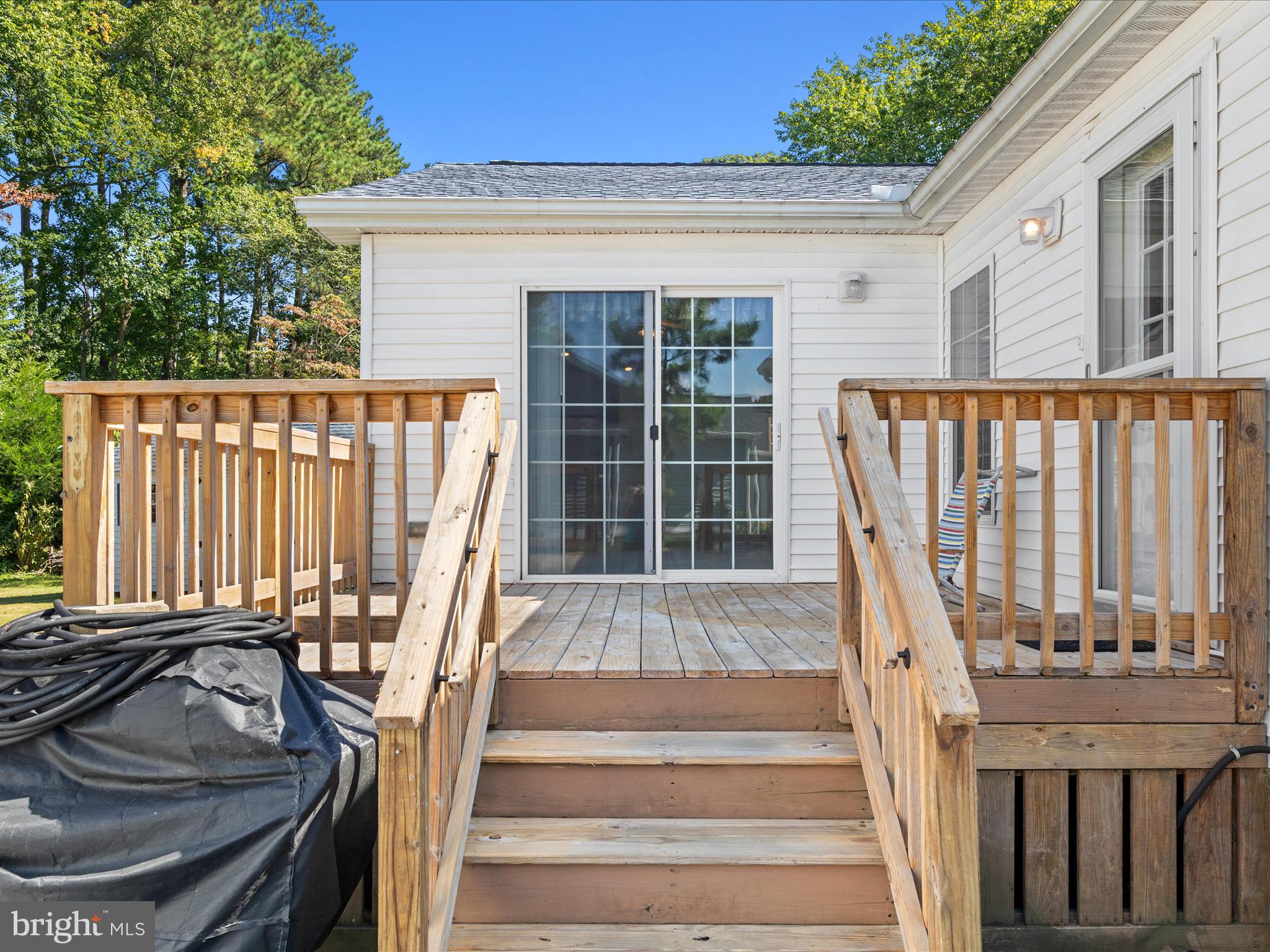 37531 Bonnie Street Ocean View, DE 19970 - Photo 49 of 62 a view of entryway with wooden floor and front door