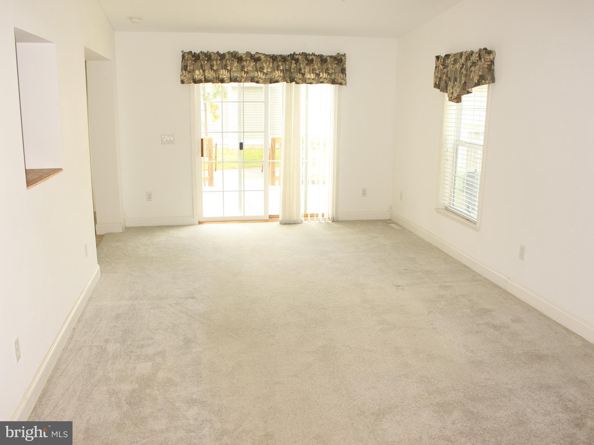 37531 Bonnie Street Ocean View, DE 19970 - Photo 55 of 62 an empty room with windows