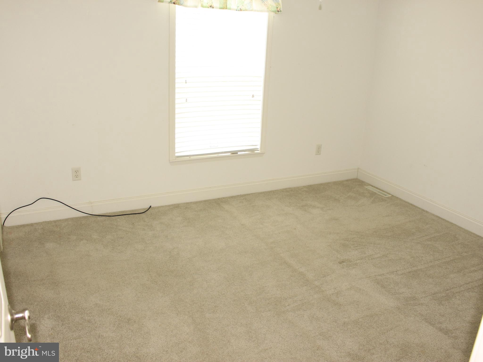 37531 Bonnie Street Ocean View, DE 19970 - Photo 56 of 62 an empty room with a window