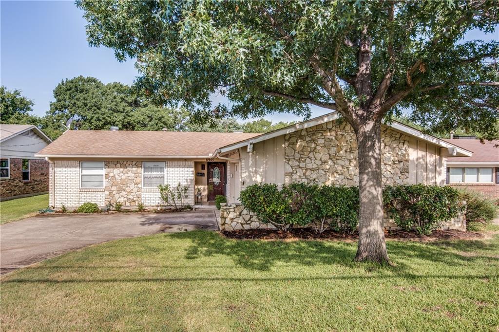 8945 Flicker Lane Dallas, TX 75238 - Photo 1 of 1 a front view of a house with garden