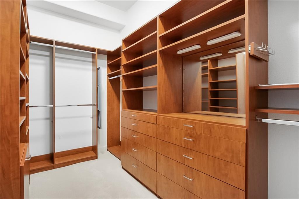 3445 Stratford Road Northeast, Unit 3601 Atlanta, GA 30326 - Photo 16 of 37 a view of walk in closet with empty racks