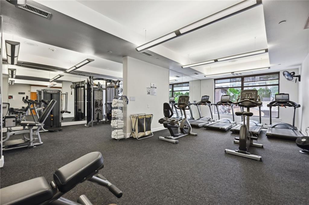 3445 Stratford Road Northeast, Unit 3601 Atlanta, GA 30326 - Photo 23 of 37 a view of a room with gym equipment