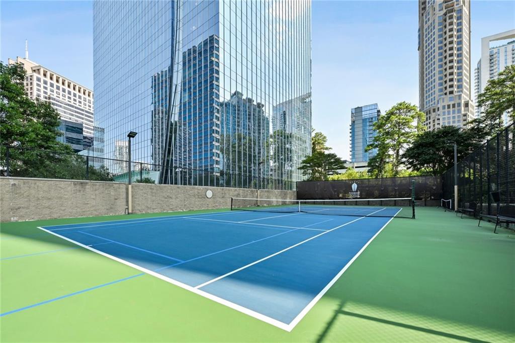3445 Stratford Road Northeast, Unit 3601 Atlanta, GA 30326 - Photo 29 of 37 a view of a tennis court