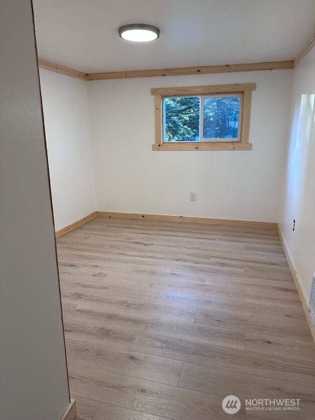 10341 184th Avenue Southwest Rochester, WA 98579 - Photo 36 of 36 an empty room with wooden floor