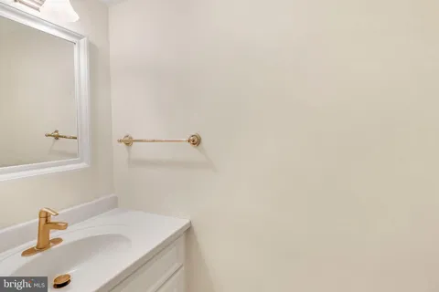 a bathroom with a sink and a vanity