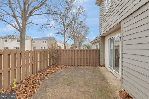 a view of a wooden fence
