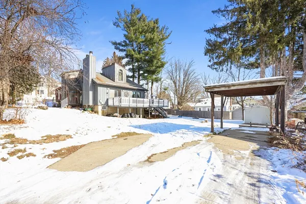 a view of a backyard of the house
