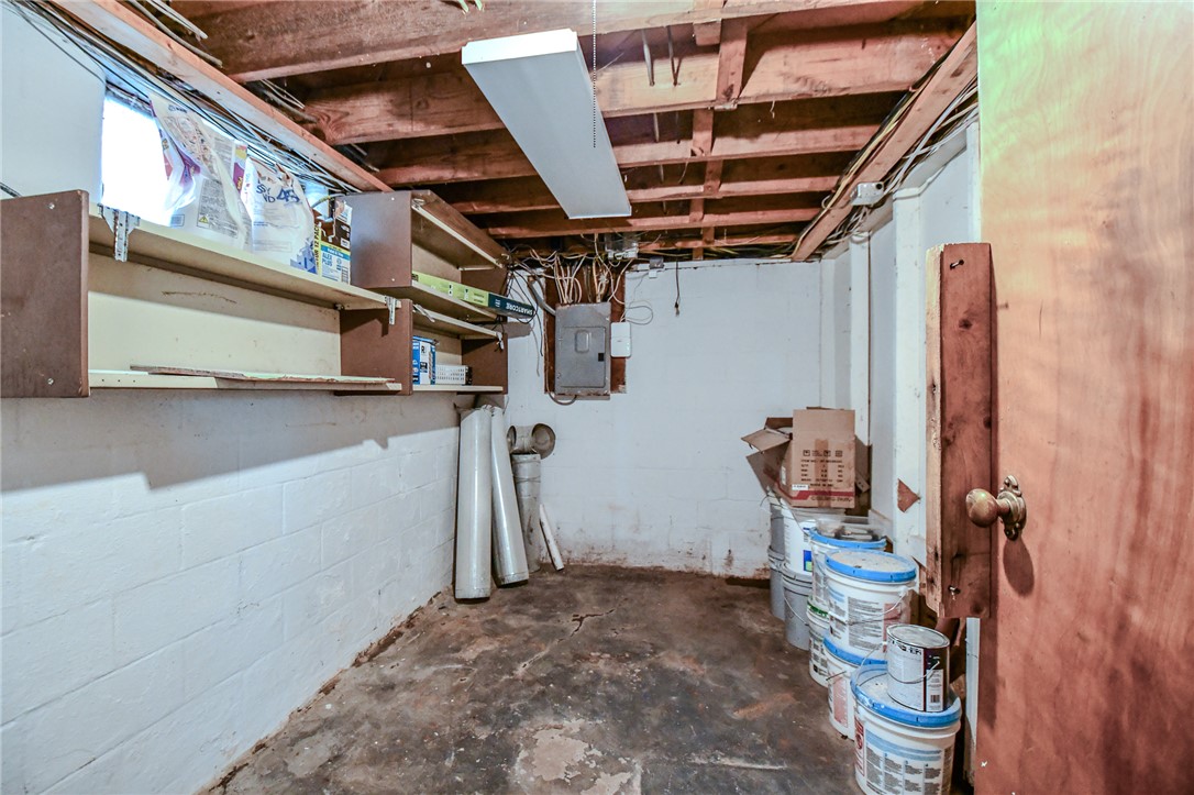816 South Smithville Road Dayton, OH 45403 - Photo 28 of 33 This versatile basement provides ample storage and potential for future expansion.
