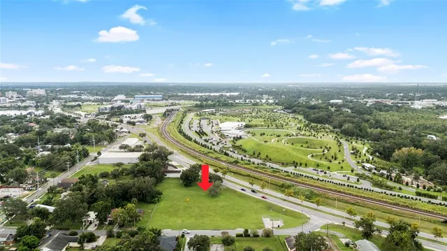 an aerial view of a house having yard