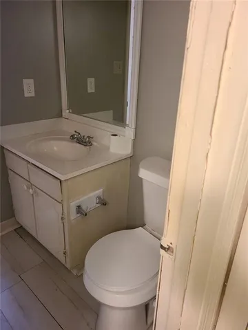 a bathroom with a sink and a toilet