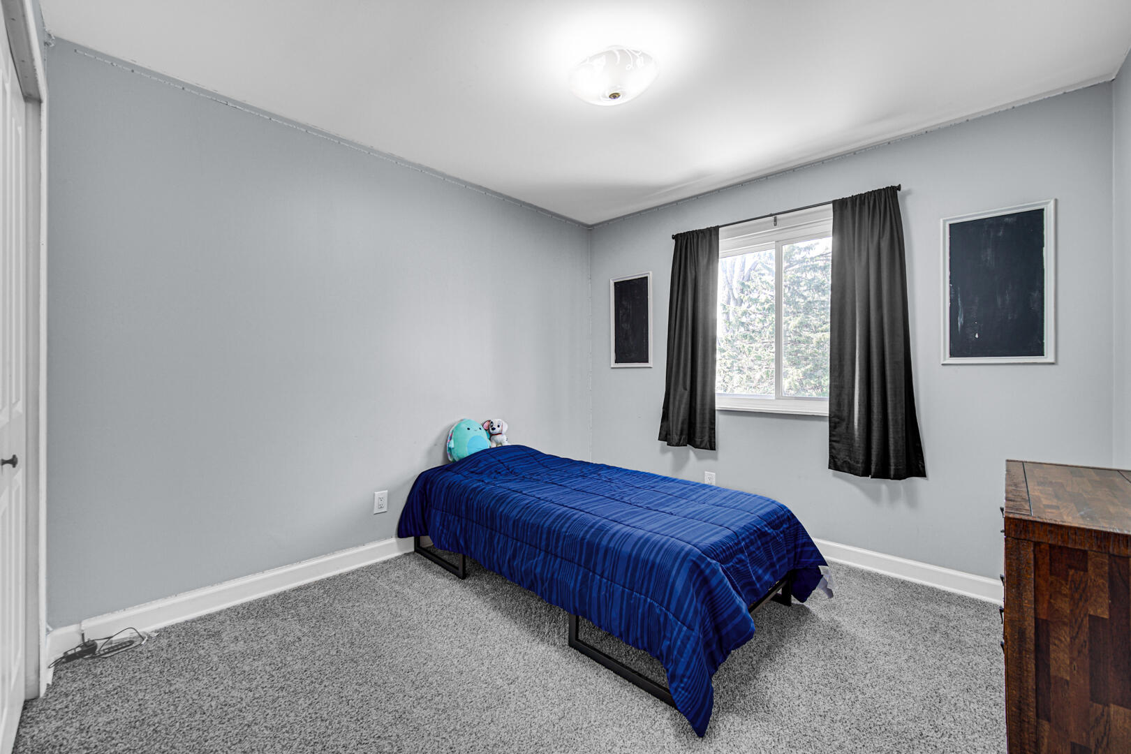 3113 Devonshire Circle Crown Point, IN 46307 - Photo 9 of 18 a bedroom with a bed lamp and window