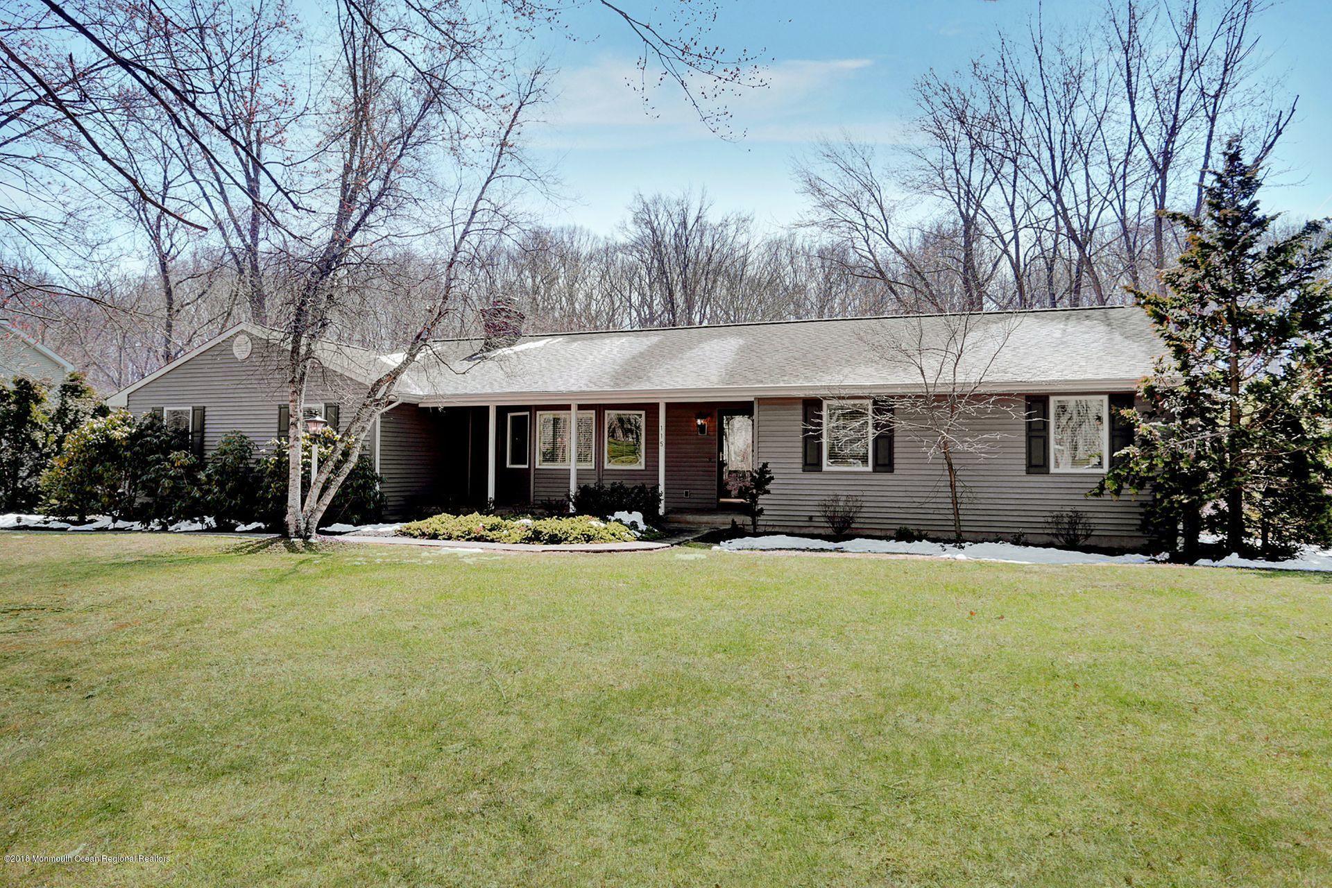 115 Crawford Road Middletown, NJ 07748 - Photo 3 of 41 a front view of a house with a yard