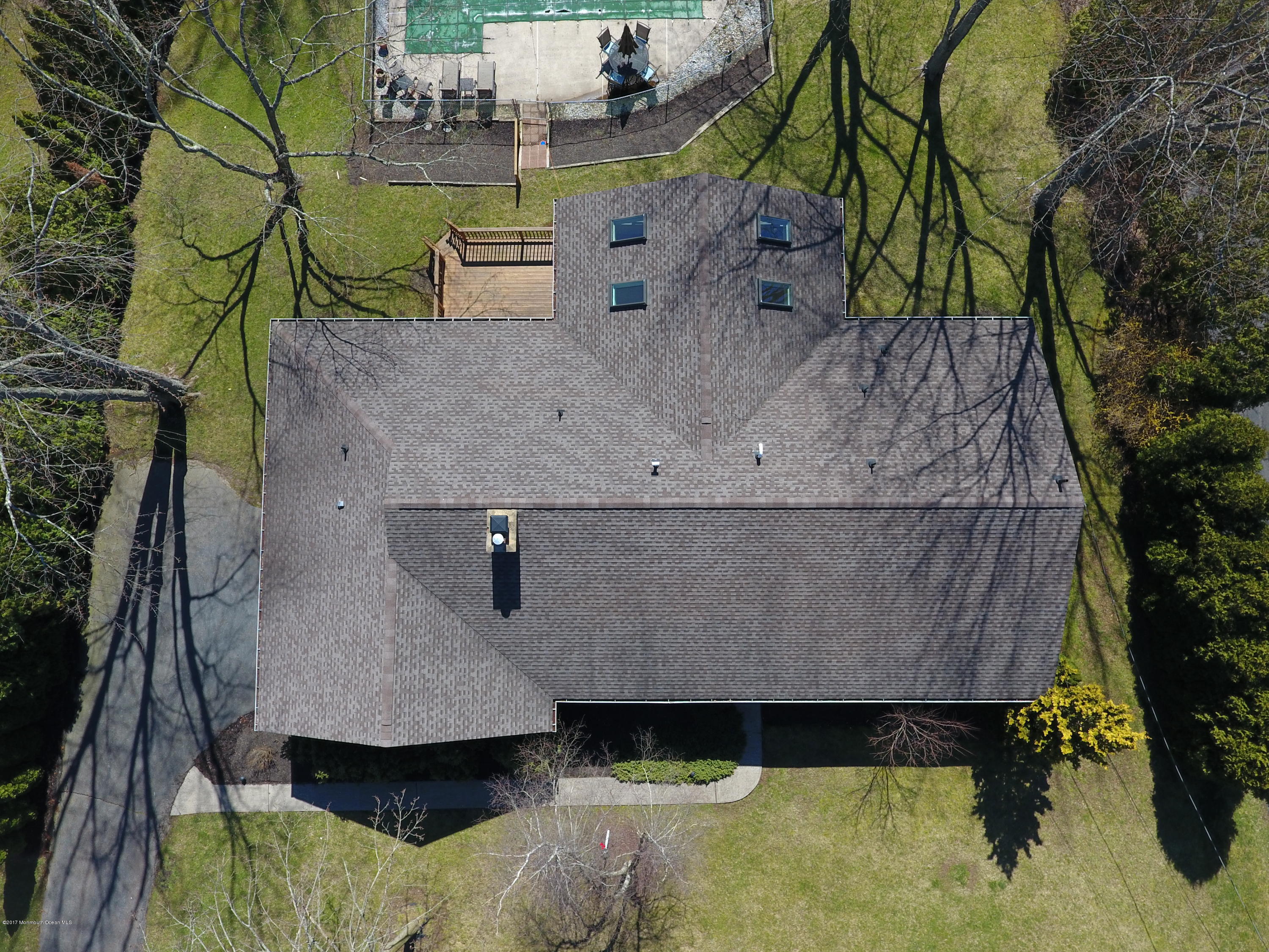 115 Crawford Road Middletown, NJ 07748 - Photo 40 of 41 an aerial view of a house with a yard