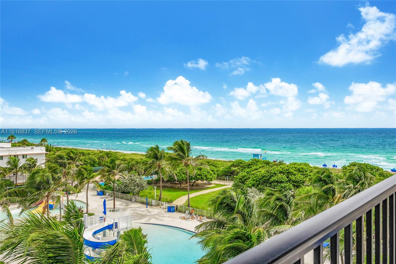 9273 Collins Avenue, Unit 507 Surfside, FL 33154 - Photo 1 of 22 a view of an ocean from a balcony