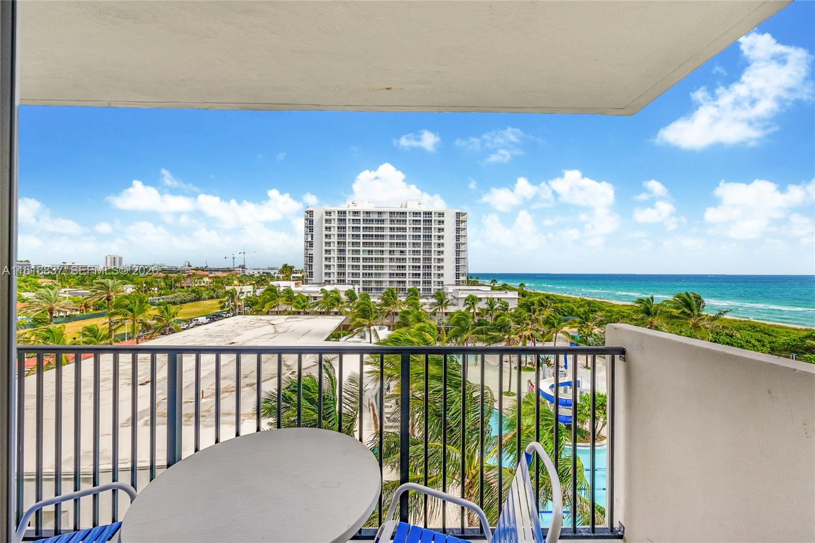 9273 Collins Avenue, Unit 507 Surfside, FL 33154 - Photo 2 of 22 a view of a balcony with an ocean view