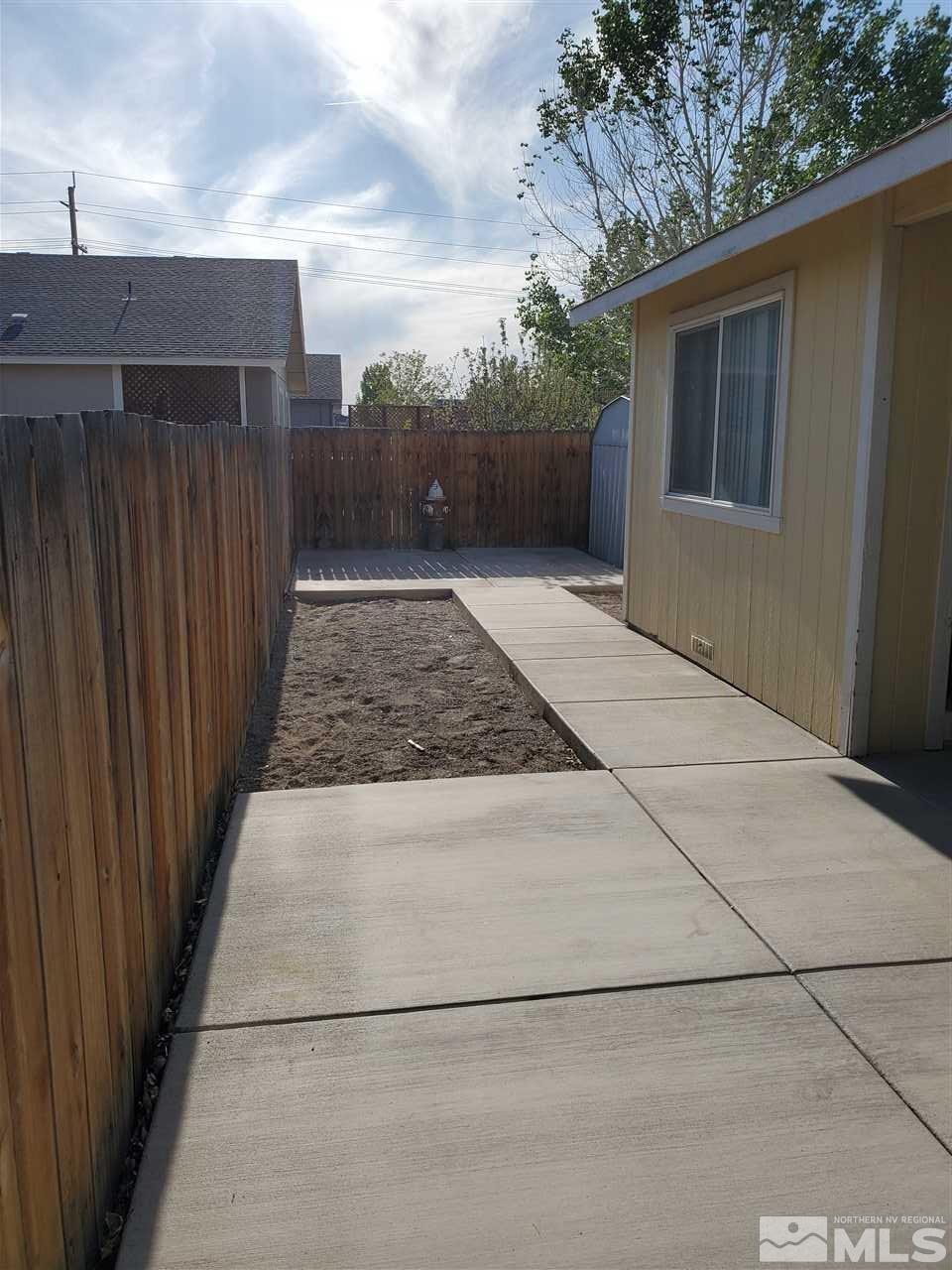 1239 Lattin Road Fallon, NV 89406 - Photo 13 of 15 a view of a backyard