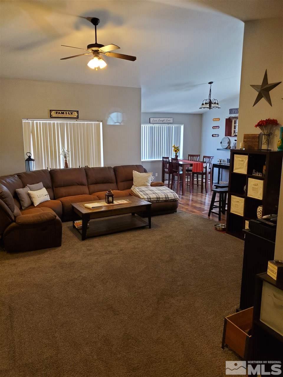 1239 Lattin Road Fallon, NV 89406 - Photo 3 of 15 a living room with furniture and a ceiling fan