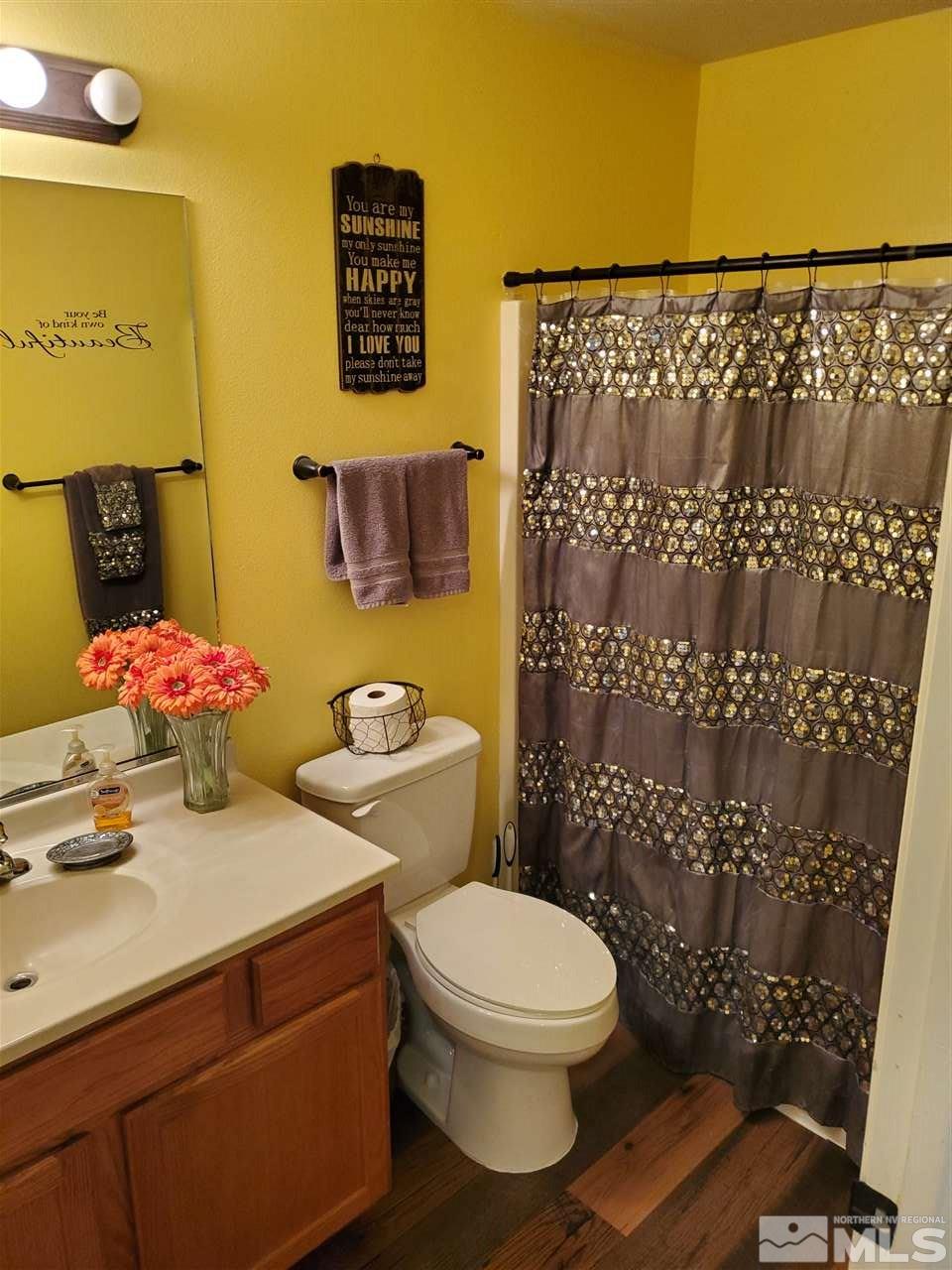 1239 Lattin Road Fallon, NV 89406 - Photo 7 of 15 a bathroom with a sink toilet and shower