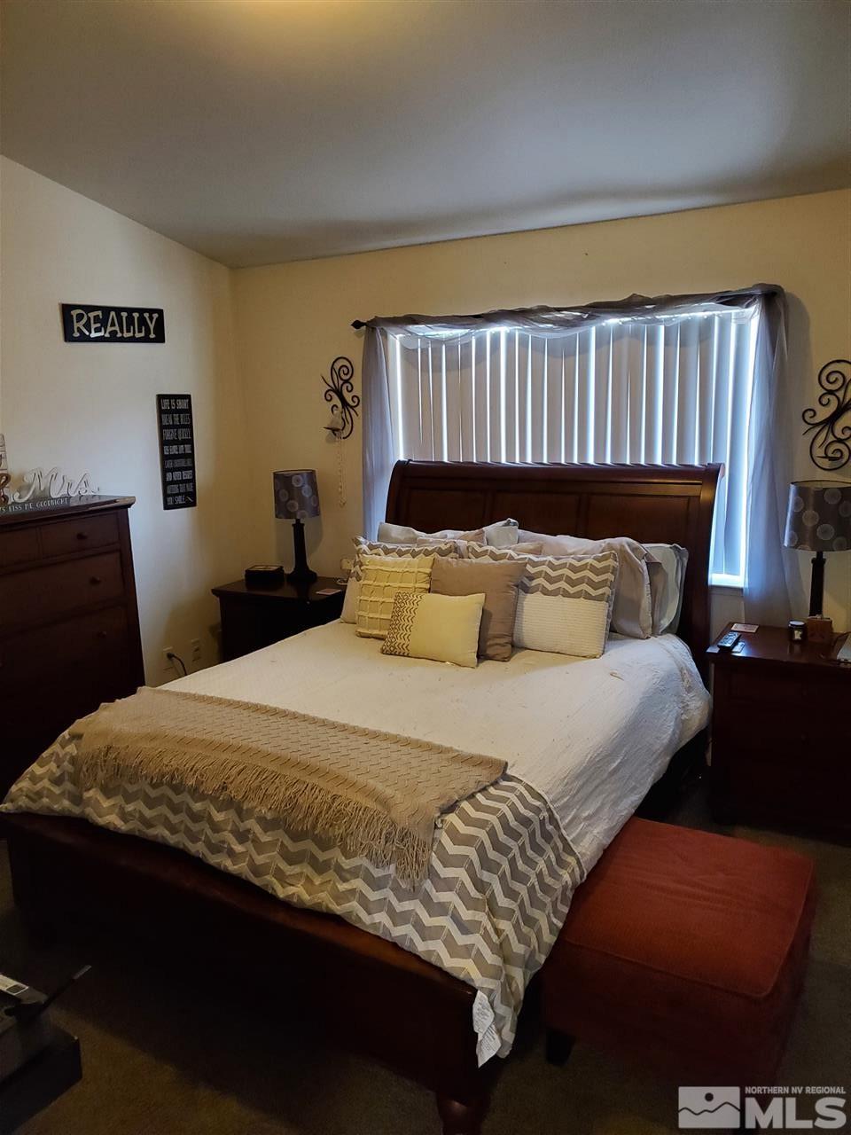 1239 Lattin Road Fallon, NV 89406 - Photo 10 of 15 a bedroom with bed and window