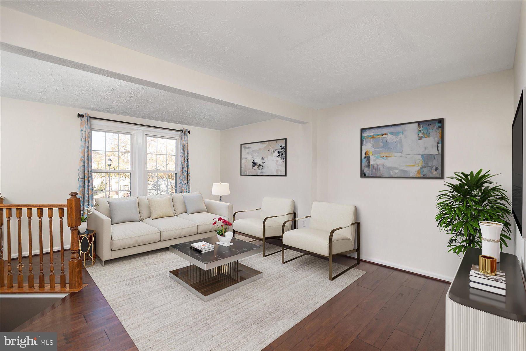 727 Dayspring Drive Odenton, MD 21113 - Photo 11 of 44 a living room with furniture a rug potted plant and a window