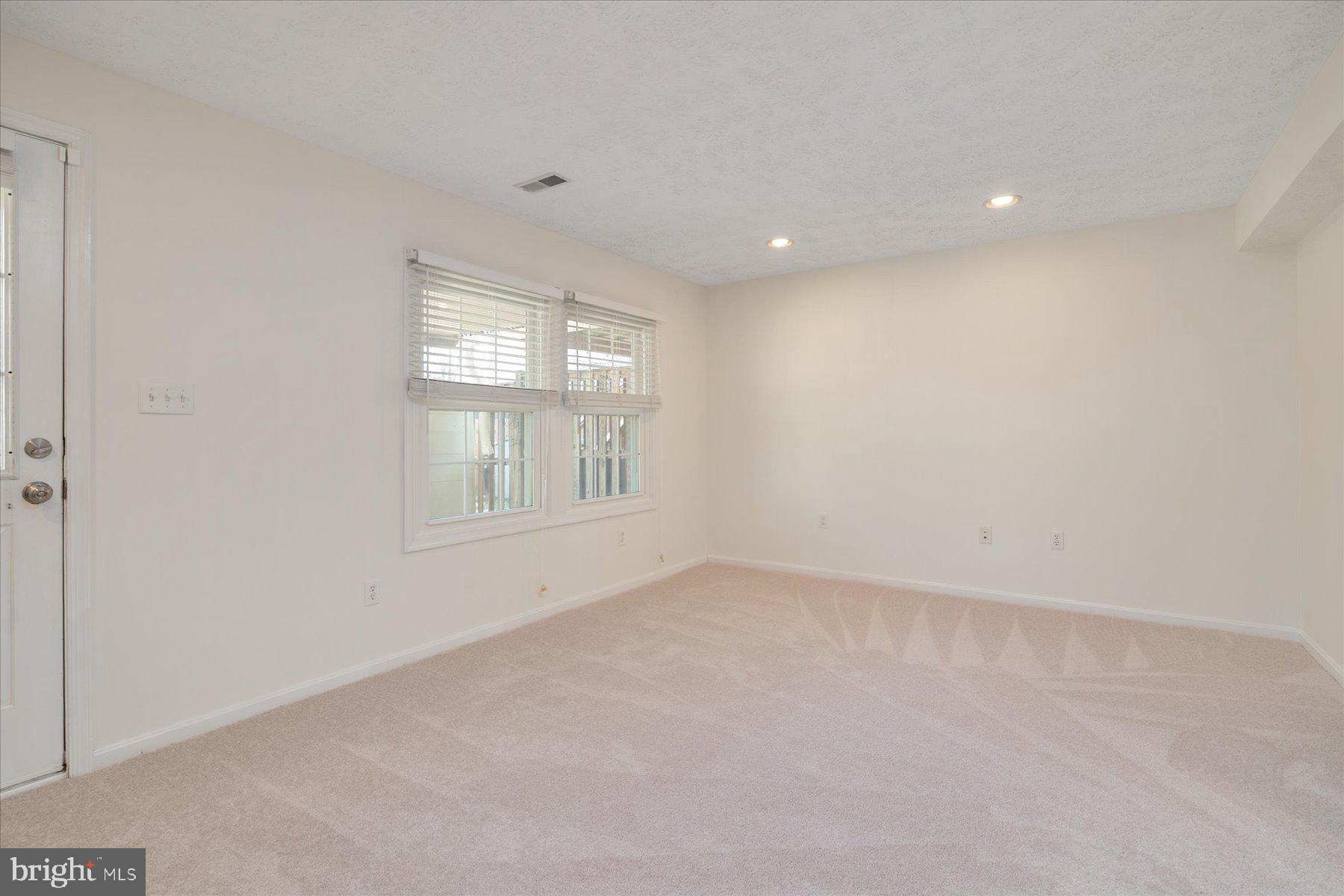 727 Dayspring Drive Odenton, MD 21113 - Photo 17 of 44 an empty room with windows