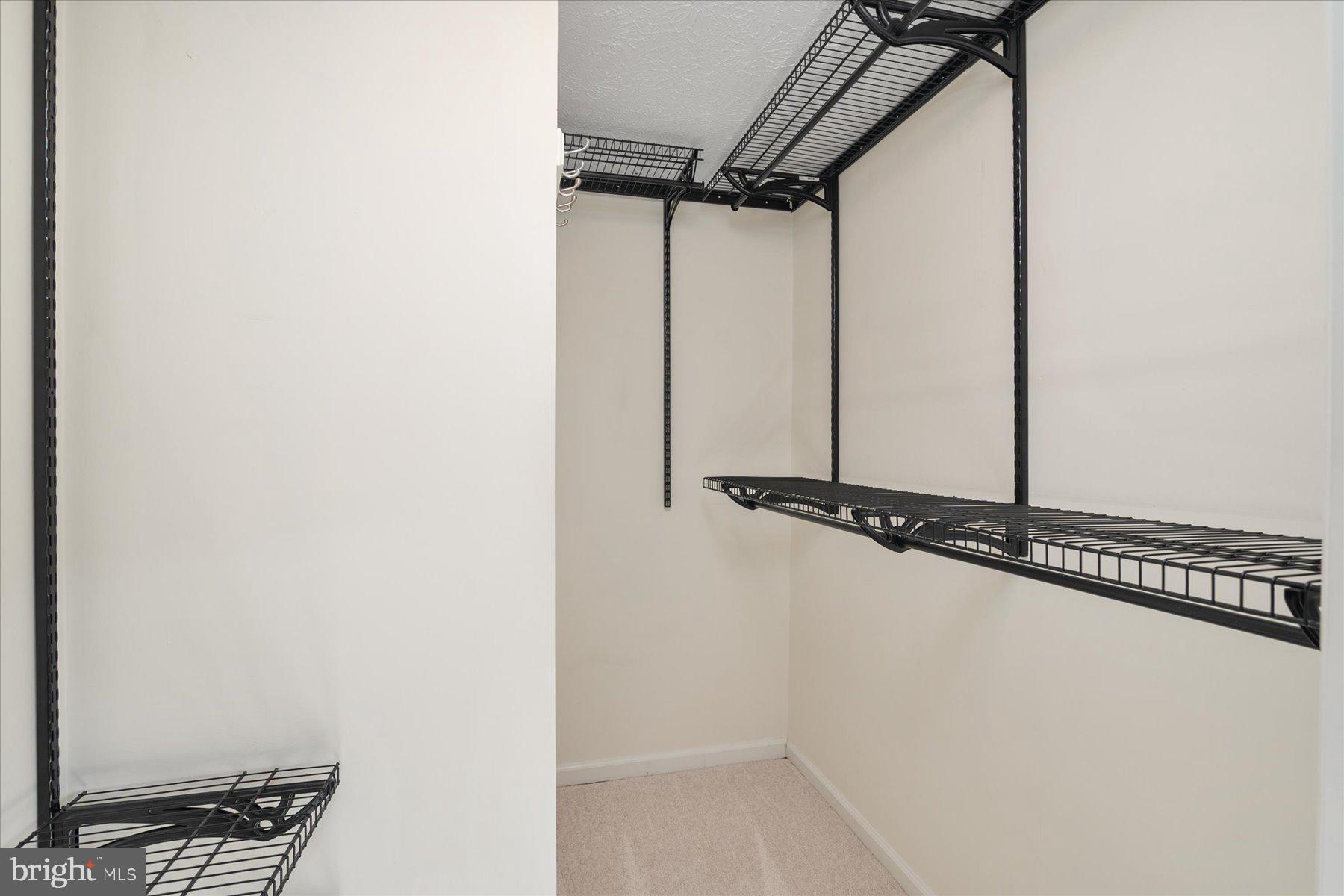 727 Dayspring Drive Odenton, MD 21113 - Photo 23 of 44 a view of a room with rack on the wall